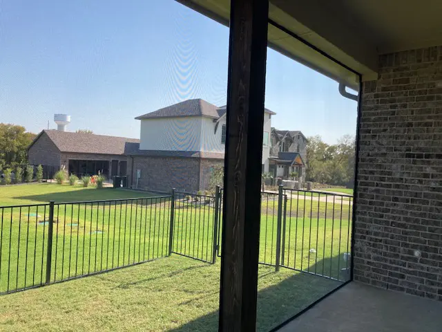 A view of a house from outside the window.